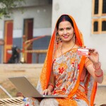 lady with card and laptop