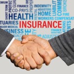 Shaking hands with insurance background