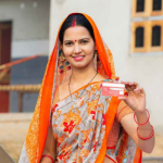 lady in saree showing some card