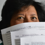 woman with tax dforms