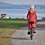 old woman riding bike